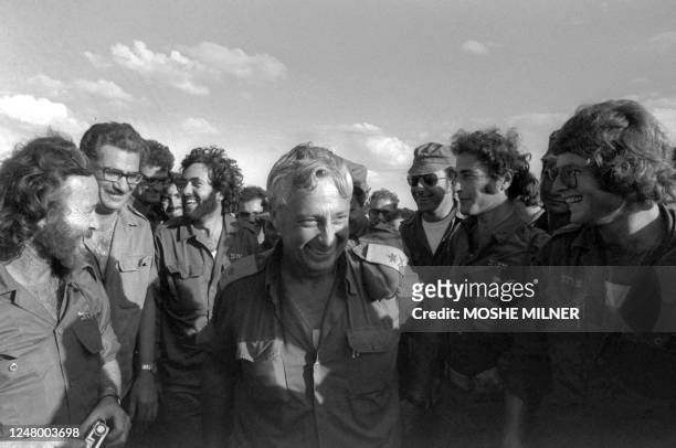 Picture released by the Israeli government press office and taken 23 November 1973 shows then Israeli Major General Ariel Sharon during the...
