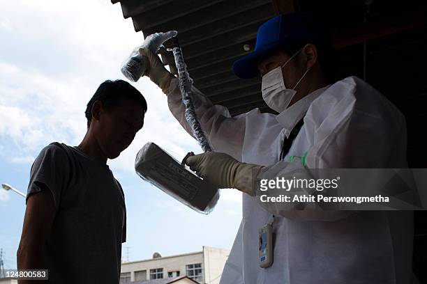 Local man, who lived around the 20km exclusion zone around the Fukushima Dai-Ichi Nuclear Power Plant, undergo a screening test for possible...