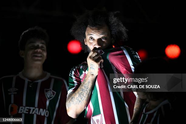 Brazilian defender Marcelo gestures during his official presentation as Fluminense's new player at the Maracana stadium in Rio de Janeiro, Brazil on...