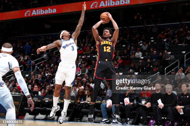 De'Andre Hunter of the Atlanta Hawks shoots the ball during the game against the Washington Wizards on March 10, 2023 at Capital One Arena in...