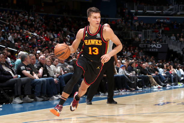 Bogdan Bogdanovic of the Atlanta Hawks moves the ball during the game against the Washington Wizards on March 10, 2023 at Capital One Arena in...