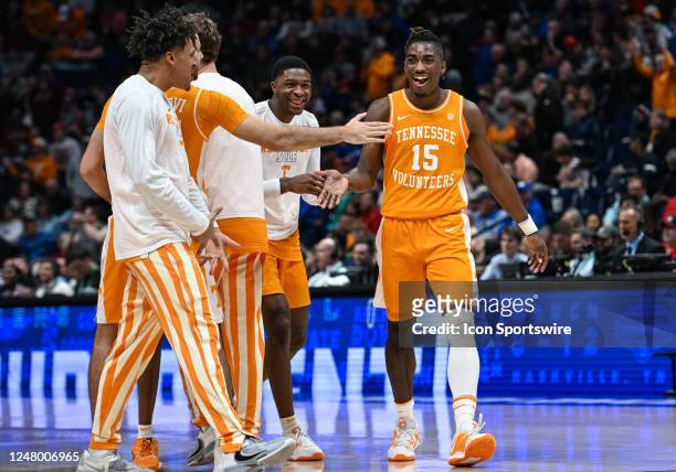 Tennessee Volunteers guard Jahmai Mashack celebrates with teammates after hitting a last second shot at the end of the first half during an SEC Mens...