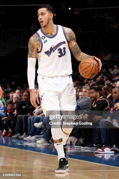 Kyle Kuzma of the Washington Wizards handles the ball during the game against the Atlanta Hawks on March 10, 2023 at Capital One Arena in Washington,...