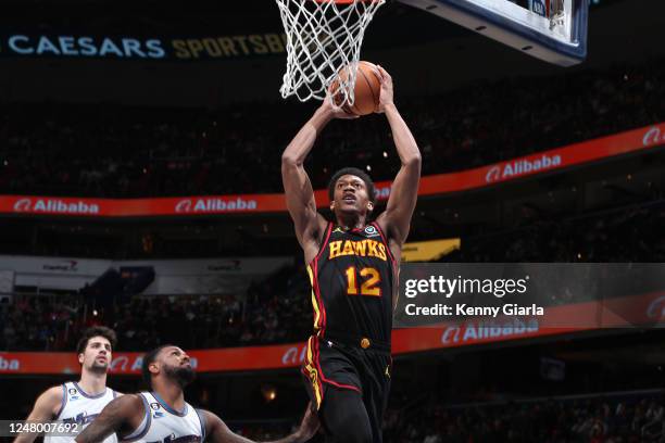De'Andre Hunter of the Atlanta Hawks drives to the basket during the game against the Washington Wizards on March 10, 2023 at Capital One Arena in...