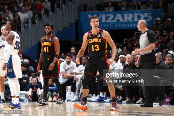 Bogdan Bogdanovic of the Atlanta Hawks celebrates during the game against the Washington Wizards on March 10, 2023 at Capital One Arena in...