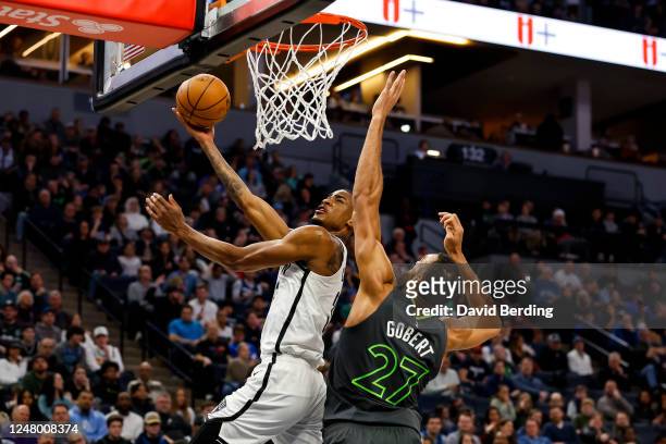 Nic Claxton of the Brooklyn Nets goes up for a shot while Rudy Gobert of the Minnesota Timberwolves defends in the second quarter of the game at...