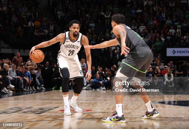 Spencer Dinwiddie of the Brooklyn Nets dribbles the ball during the game against the Minnesota Timberwolves on March 10, 2023 at Target Center in...