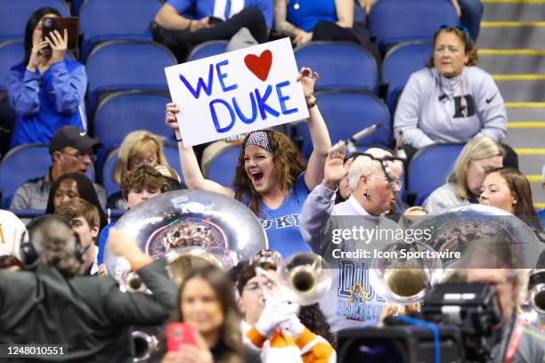 Duke Blue Devils fan holds up a sign during the ACC Tournament against the Miami Hurricanes on March 10, 2023 at Greensboro Coliseum in Greensboro,...