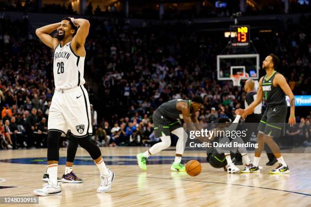 Spencer Dinwiddie of the Brooklyn Nets reacts to fouling Mike Conley of the Minnesota Timberwolves in the fourth quarter of the game at Target Center...