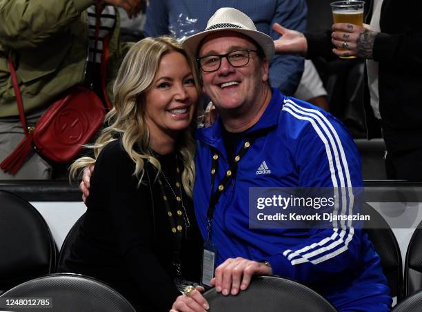 Jeanie Buss, owner of the Los Angeles Lakers, and Jay Mohr attend a basketball game between the Los Angeles Lakers and the Toronto Raptors basketball...