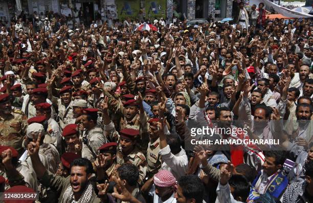 Yemeni anti-government protesters shout slogans during a demonstration calling for the ouster of President Ali Abdullah Saleh in Sanaa on May 29,...