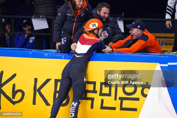 Suzanne Schulting of the Netherlands reacts with coach Niels Kerstholt of the Netherlands after competing on the Women's 1500m during the ISU World...