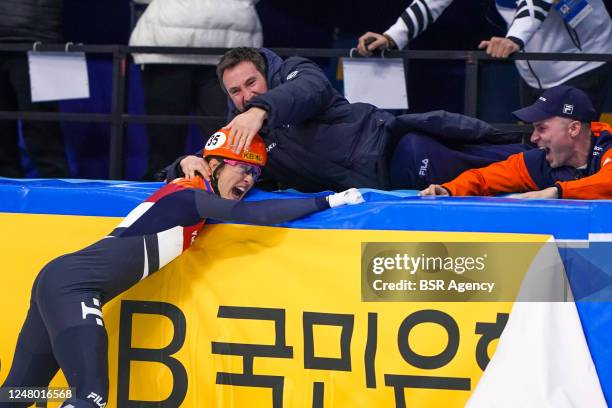 Suzanne Schulting of the Netherlands reacts with coach Niels Kerstholt of the Netherlands after competing on the Women's 1500m during the ISU World...