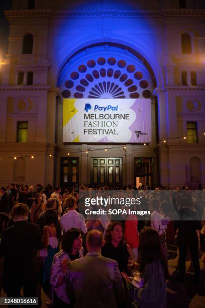 Crowd of attendees arrive in style, donning their finest attire Paolo Sebastian fashion show at the Royal Exhibition Building in Melbourne.