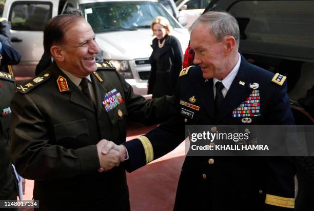 Egyptian Lieutenant General Sami Anan greets US General Martin Dempsey, chairman of the Joint Chiefs of Staff, upon the latter's arrival for a...