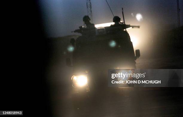 British soldiers from the 16 Air Assault Brigade go on a night patrol in Lashkar Gah, Helmand province, southern Afghanistan, 14 May 2006. British...