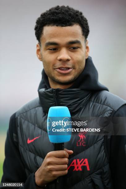 Liverpool's Dutch striker Cody Gakpo speaks during a BT Sport interview ahead of the English Premier League football match between Bournemouth and...