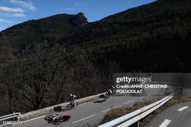 Ineos Grenadiers' British rider Michael Joshua Tarling crashes during the 7th stage of the 81st Paris - Nice cycling race, 143 km between Nice and...