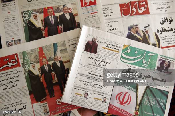 Newspapers in Tehran feature on their front page news about the China-brokered deal between Iran and Saudi Arabia to restore ties, signed in Beijing...