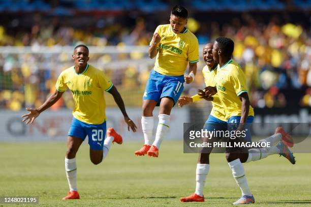 Sundowns' midfielder Marcelo Allende celebrates scoring his team's first goal during the CAF Champions League group B match between South Africas...