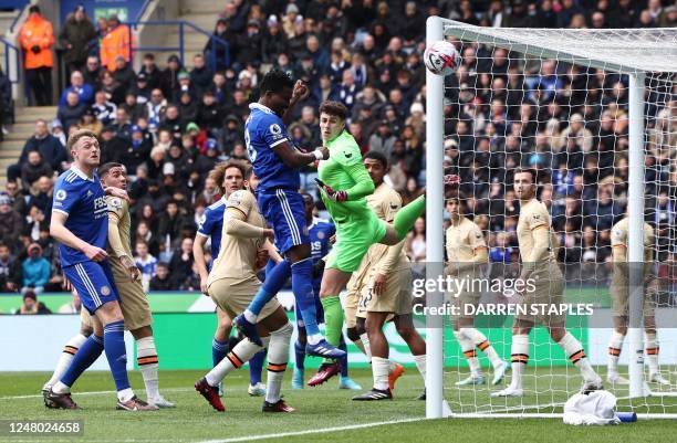 Leicester City's Ghanaian midfielder Daniel Amartey (C0 header but fails to score during the English Premier League football match between Leicester...