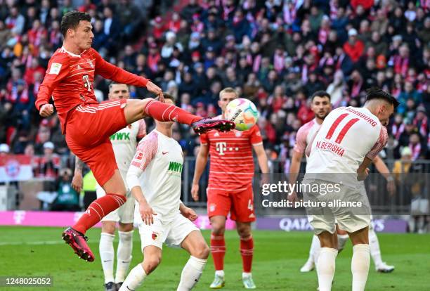 March 2023, Bavaria, Munich: Soccer, Bundesliga, FC Bayern München - FC Augsburg, Matchday 24 at Allianz Arena. Benjamin Pavard of Munich scores to...