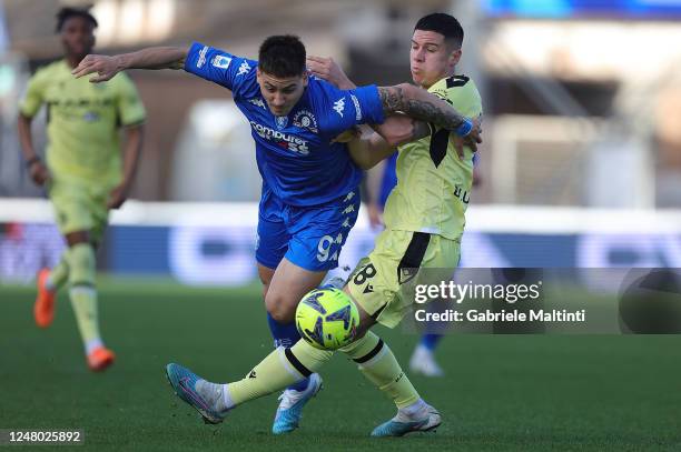 Martín Adrián Satriano of Empoli FC battles for the ball with u 18 of Udinese Calcio during the Serie A match between Empoli FC and Udinese Calcio at...