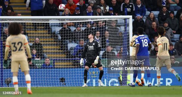 Leicester City's Welsh goalkeeper Danny Ward watches the ball as he concedes a secnond goal, bu Chelsea's German midfielder Kai Havertz during the...