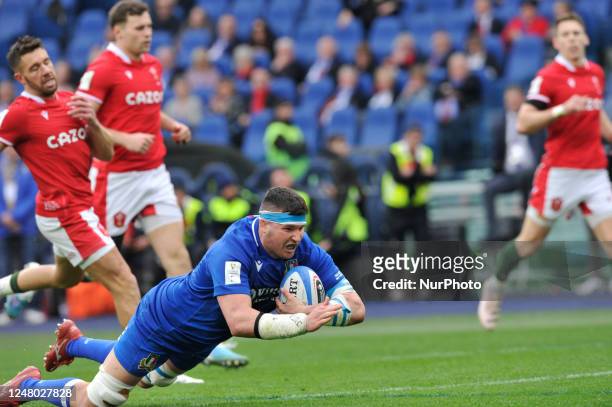 Sebastian Negri scores a try during the 2023 Guinness Six Nations Rugby Championship match between Italy and Wales at the Olimpic Stadium in Rome,...
