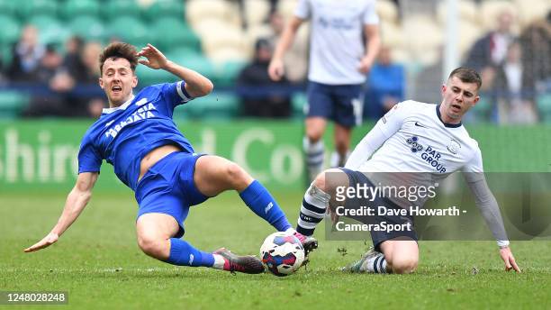 Preston North End's Ben Woodburn battles with Cardiff City's Ryan Wintle during the Sky Bet Championship between Preston North End and Cardiff City...