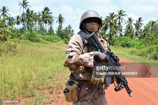 Nigerien soldier looks on as he takes part in the Flintlock 2023 military training hosted by the International Counter-Terrorism Academy, in...