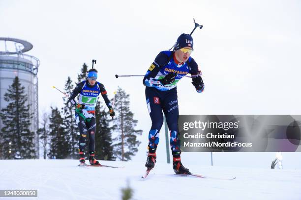 Vebjoern Soerum of Norway leads Didier Bionaz of Italy during the Mens 4x7.5 km Relay at the BMW IBU World Cup Biathlon Oestersund on March 11, 2023...