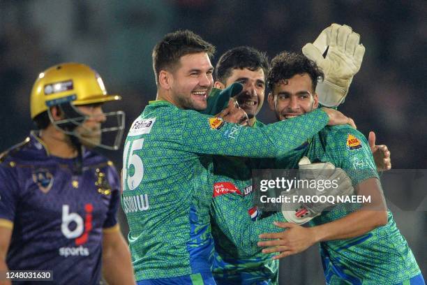 Multan Sultans' Abbas Afridi celebrates the wicket of Quetta Gladiators' Umar Akmal as he walks back during the Pakistan Super League Twenty20...