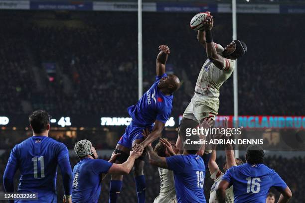 England's lock Maro Itoje wins line-out ball during the Six Nations international rugby union match between England and France at Twickenham Stadium,...