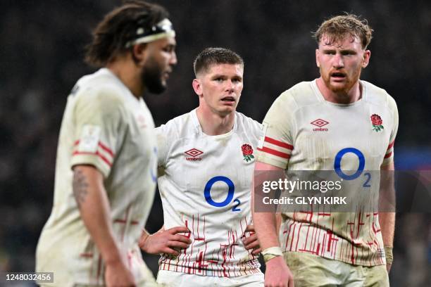 England's Owen Farrell reacts to conceding another try during the Six Nations international rugby union match between England and France at...
