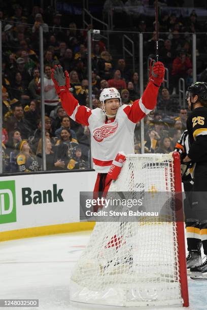 Alex Chiasson of the Detroit Red Wings scores in the first period against the Boston Bruins at the TD Garden on March 11, 2023 in Boston,...