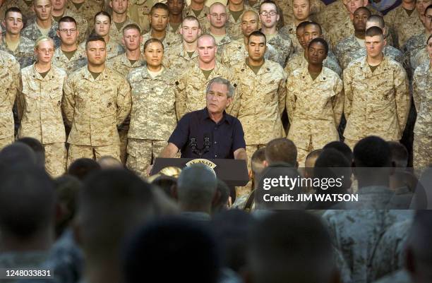 President George W. Bush speaks at Al-Asad Air Base in Anbar Province, Iraq, 03 September 2007. Addressing cheering Marines at this base in Anbar...