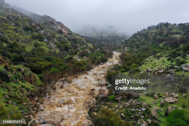 View of Tule River as snow melted from the mountain during heavy rain in Springville, California on March 11, 2023 as atmospheric river storms hit...