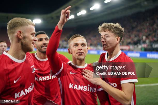 Alkmaar's players Jens Odgaard , Jesper Karlsson and Sven Mijnans celebrate the 1-0 during the Dutch premier league match between AZ Alkmaar and FC...