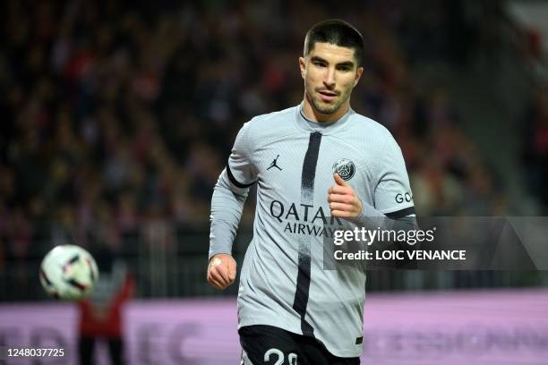 Paris Saint-Germain's Spanish midfielder Carlos Soler celebrates after scoring a goal during the French L1 football match between Stade Brestois 29...