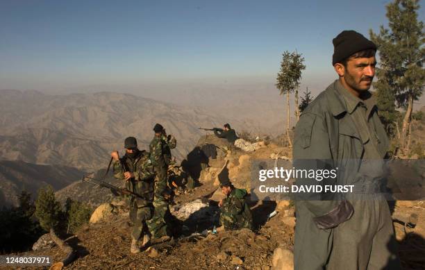 Afghan National Army soldiers prepare to set off on patrol through the Spira mountains in search of insurgents during day four of Operation Radu Bark...