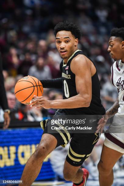 Tyrin Lawrence of the Vanderbilt Commodores drives towards the basket against the Texas A&M Aggies in the second half during the semifinals of the...