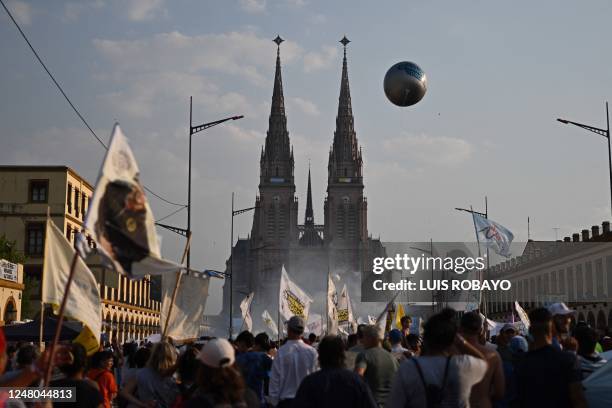 Faithfuls march towards the Basilica of Lujan on March 11 in Lujan, Buenos Aires province, to participate in a mass to celebrate 15 years of the...