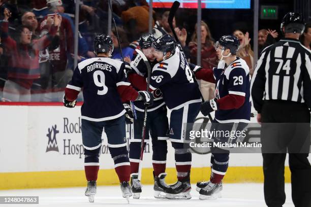 Evan Rodrigues, Cale Makar, Mikko Rantanen and Nathan MacKinnon of the Colorado Avalanche celebrate the game-winning goal against the Arizona Coyotes...