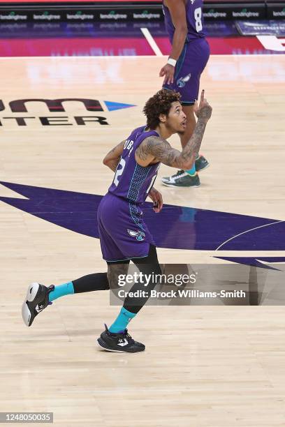 Kelly Oubre Jr. #12 of the Charlotte Hornets celebrates against the Utah Jazz on March 11, 2023 at Spectrum Center in Charlotte, North Carolina. NOTE...