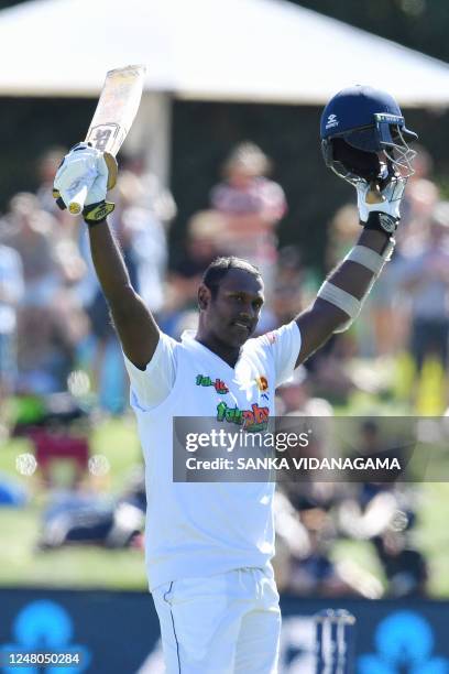 Sri Lanka's Angelo Mathews celebrates after scoring 100 runs during the fourth day of the first Test cricket match between New Zealand and Sri Lanka...