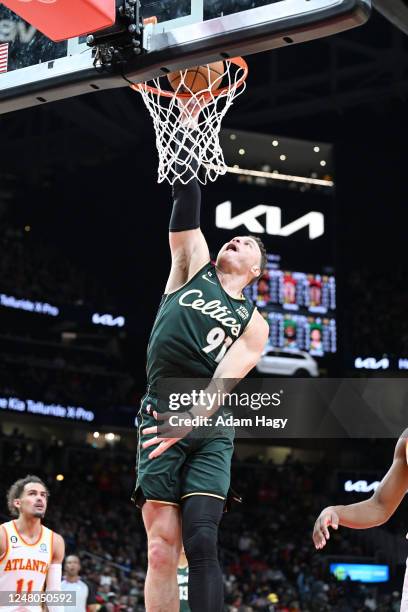 Blake Griffin of the Boston Celtics dunks the ball against the Atlanta Hawks on March 11 at State Farm Arena in Atlanta, Georgia. NOTE TO USER: User...