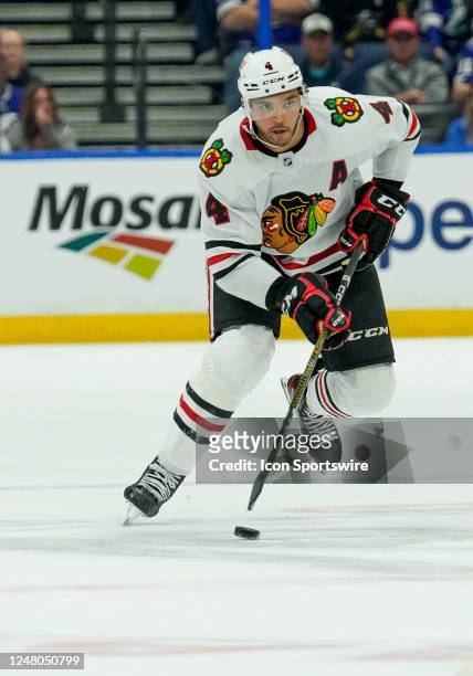 Chicago Blackhawks defenseman Seth Jones skates with the puck during the NHL Hockey match between the Tampa Bay Lightning and Chicago Blackhawks on...