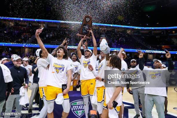 The Kent State Golden Flashes celebrate following the MAC Mens Basketball Tournament Championship game between the Kent State Golden Flashes and...