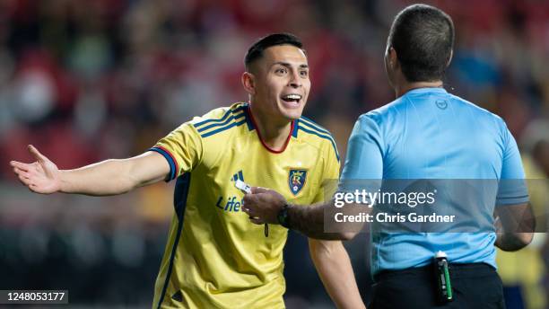 Rubio Rubin of Real Salt Lake argues with referee Alex Chilowicz during the first half of their game against the Austin FC at America First Field on...